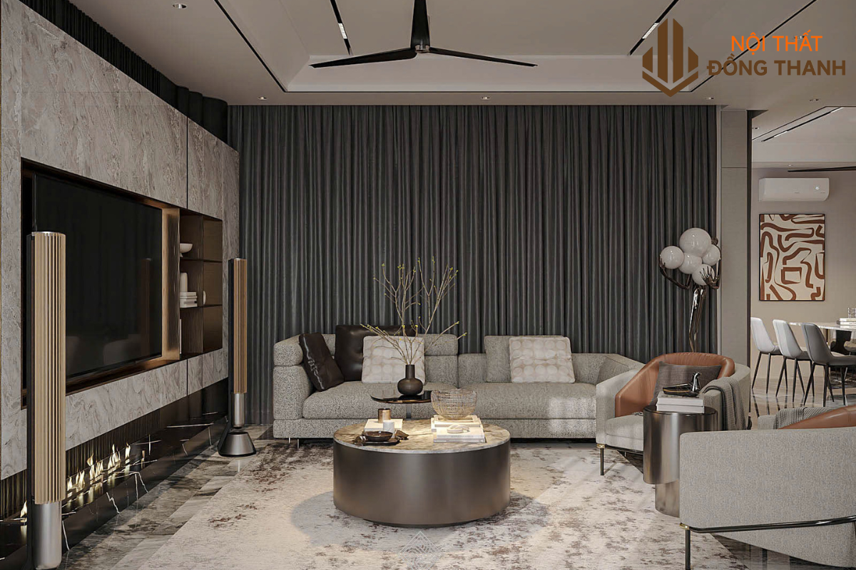 Sofa cùng các hệ vách tivi, quạt trần tạo nên không gian tiện nghi